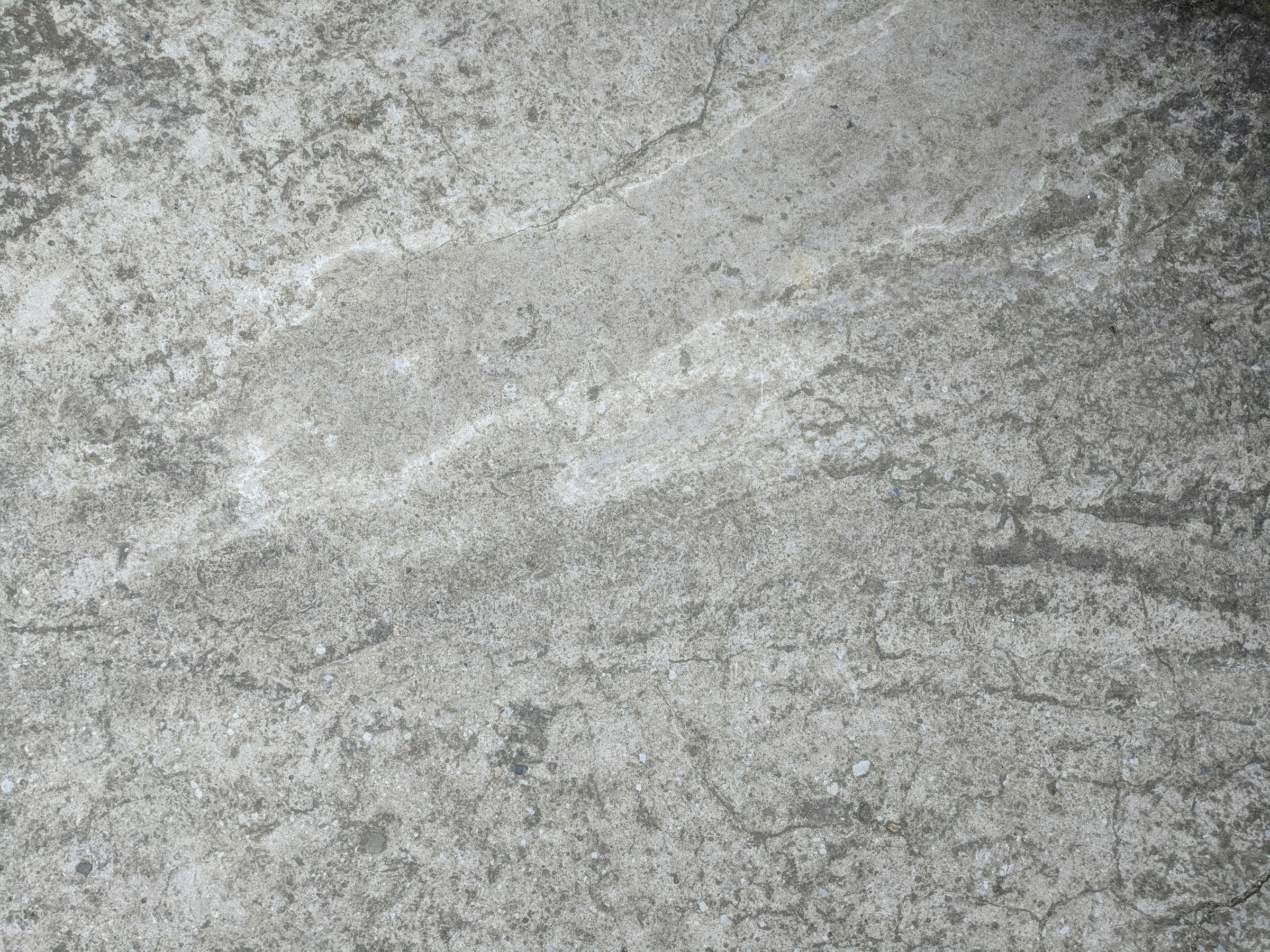 Monolithic grey natural stone slab, texture reference for the Wallcan collection