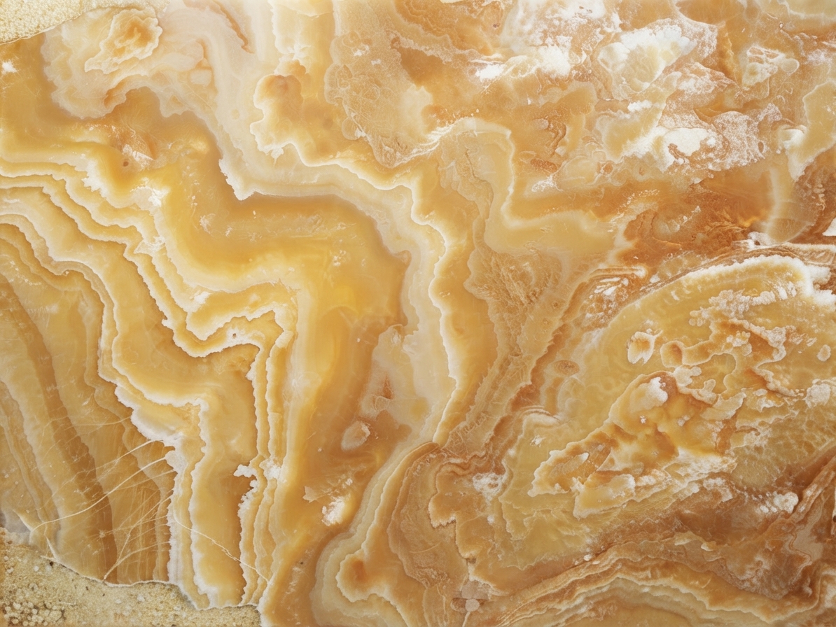 Close-up of warm veined onyx stone, the material used for Wallcan speaker cabinets